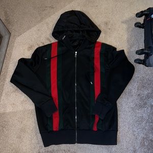 Black Gucci bomber jacket, nothing wrong, lightly worn.